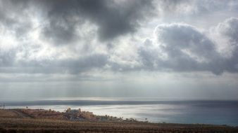 Beautiful Atlantic ocean coast of Fuerteventura Island under cloudy sky