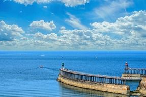 Pier in the blue ocean