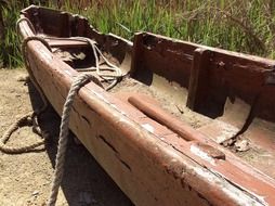 Old wooden boat on coast