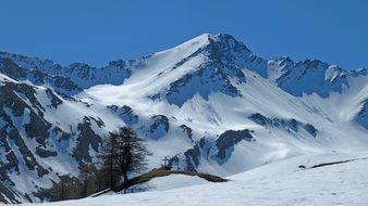 snowy landscape with mountain massif