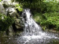 waterfall on the backgroubd of scenic nature