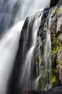 waterfall stream on a rock