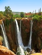 waterfall falls off a cliff