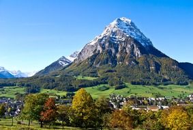 scenic snow-capped mountains at fall, switzerland, glarus