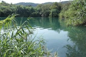 landscape of a lake with blue water