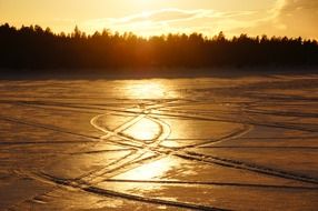 golden sunset with snow traces landscape