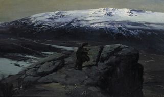 a picture on which a lone man depicted on the mountain at dusk