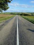 white markings on an asphalt road