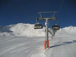 landscape of chairlift on snow mountain