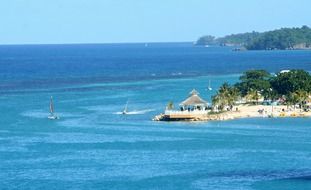 people on a tropical island in the ocean