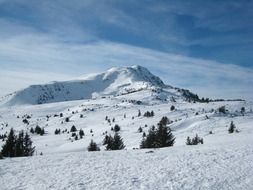 snow valley on the background of the mountains in Germany