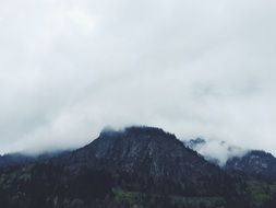 Alpine mountains in the mist