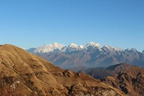 distant view of the snow caps of mountains