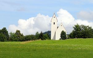 white modest chapel in a picturesque place, chiemgau