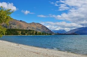 cloudy sky over picturesque lake