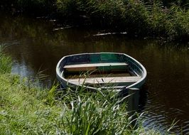 landscape of rowing boat on a small river