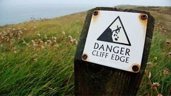 stone crash warning sign