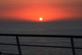 big orange evening sun over the ocean