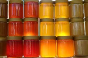 Flower honey jars at the back light