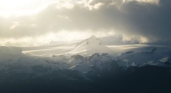 clouds over mountain peaks