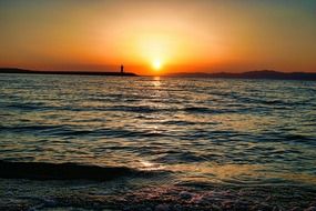 bright sun at sunset over the sea