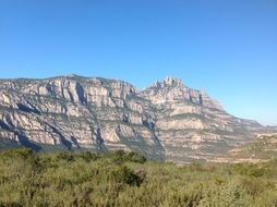 remote view of the cliffs on a sunny day