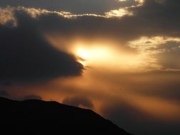 sunse tmountains clouds