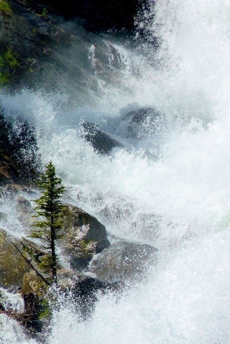 water splashing on the rocks