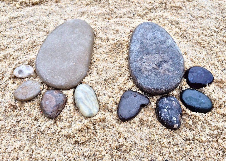 pebble footprints on the beach