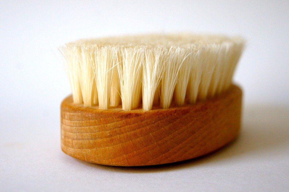 wooden massage brush on the table
