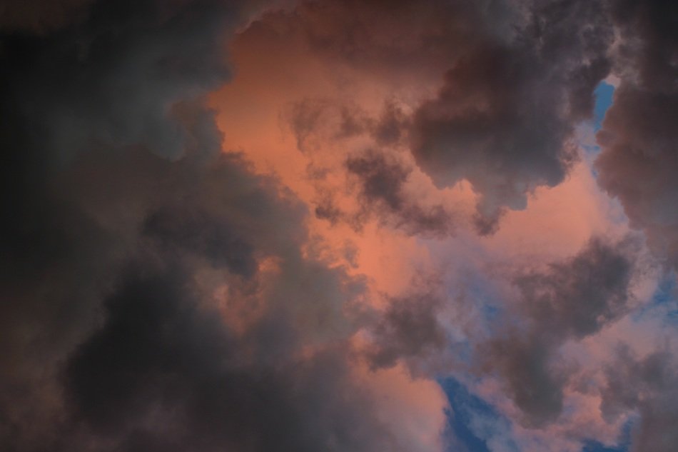 landscape of the thunderclouds and pink cloudy sky over Finland