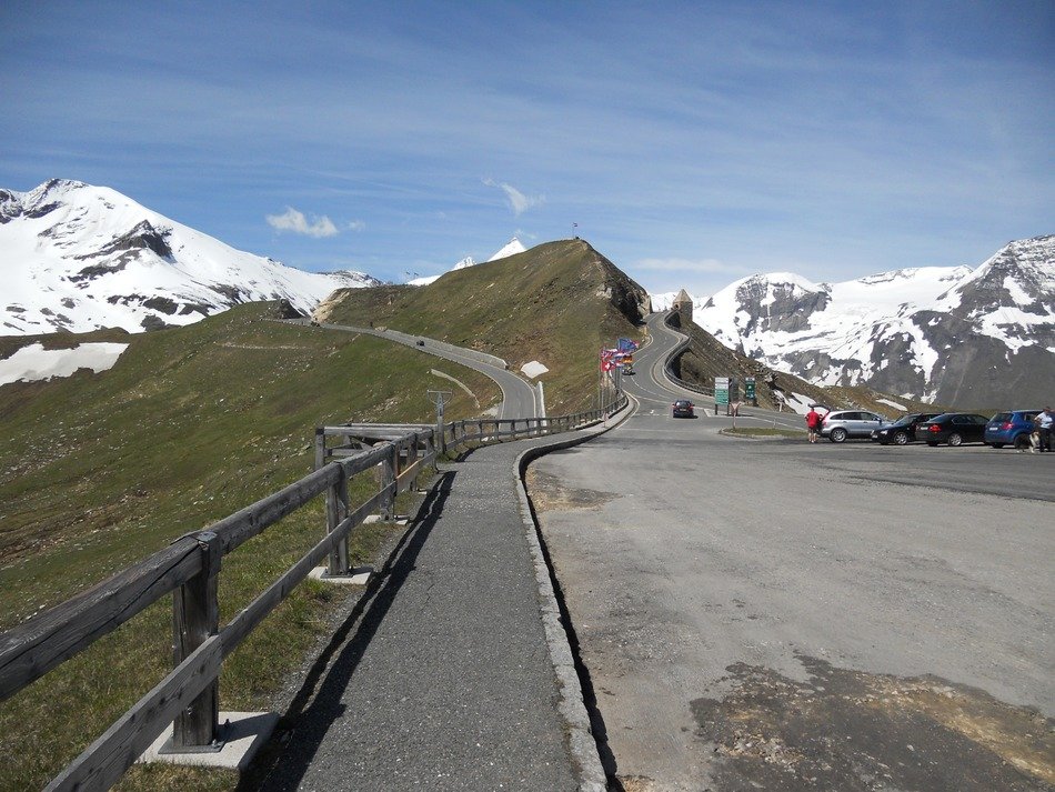 empty road to the mountains in austria