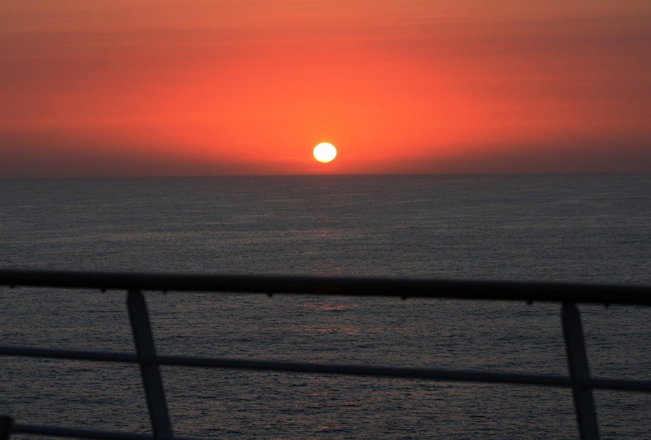 big orange evening sun over the ocean