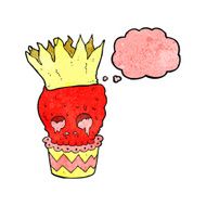 spooky skull cupcake cartoon with thought bubble N4