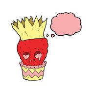 spooky skull cupcake cartoon with thought bubble N6