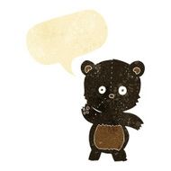 cartoon waving black bear with speech bubble N4
