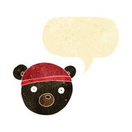 cartoon black bear cub wearing hat with speech bubble