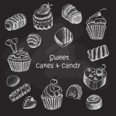 Set of isolated sweet cakes and sweets on dark background