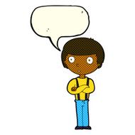 cartoon staring boy with folded arms speech bubble N6