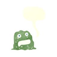 cartoon slime creature with speech bubble N10