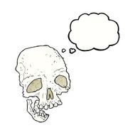 cartoon ancient spooky skull with thought bubble N7