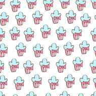 Vector seamless background with cupcakes