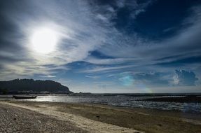 bright sun on an empty beach