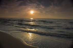 landscape of sunset over the summer beach