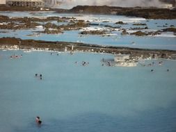 boats in the blue lagoon in iceland