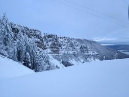 snow covered mountains at dusk in france