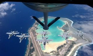 military planes in flight above ocean, usa, florida