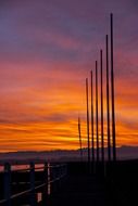 Flag poles in the beautiful colorful morning