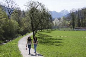 girls in the spring park in the mountains