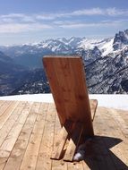 wooden chair on alpine mountain